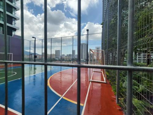 a view of a basketball court from a building at Executive Premium Urban Suites - Jelutong in Jelutong