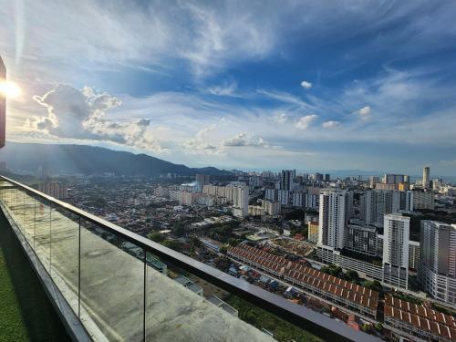 a view of a city from the top of a building at Executive Premium Urban Suites - Jelutong in Jelutong
