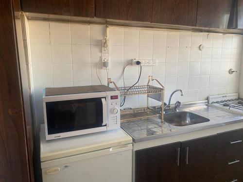 Η κουζίνα ή μικρή κουζίνα στο Depto La Boca