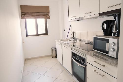 Kuchyň nebo kuchyňský kout v ubytování Casa Cubada