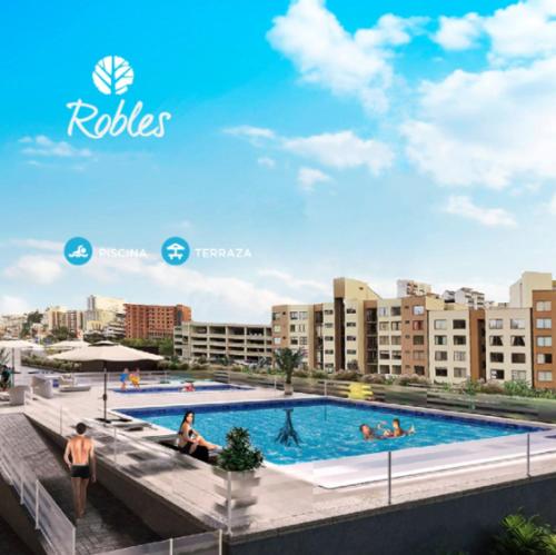 馬尼薩萊斯的住宿－Robles10 El Cable Luxury Highrise，度假村游泳池的图片