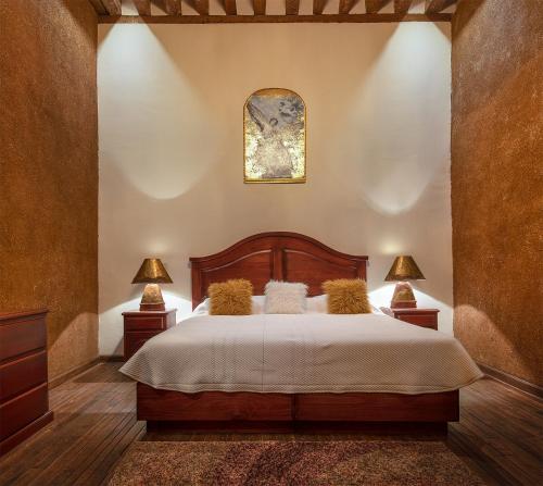Uma cama ou camas num quarto em HOTEL LA CASA DE DON VASCO