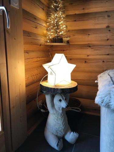 a lamp on top of a stuffed animal with a hat on it at Chalet Cervus in Font Romeu Odeillo Via