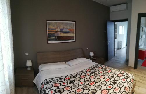 Ένα ή περισσότερα κρεβάτια σε δωμάτιο στο B&B Antico Porto Tarquinia