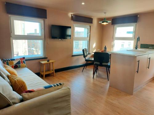 Телевизор и/или развлекательный центр в Cathedral Quarter Apartments