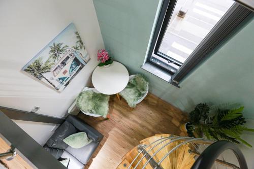 an overhead view of a living room with a plant at B101 Boutique City Loft in Coventry