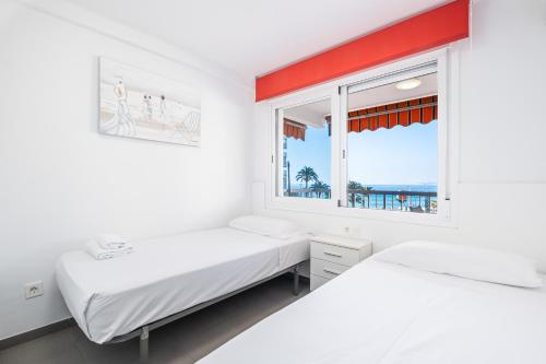 Postel nebo postele na pokoji v ubytování Rincon Suite 3-C Apartment Levante Beach