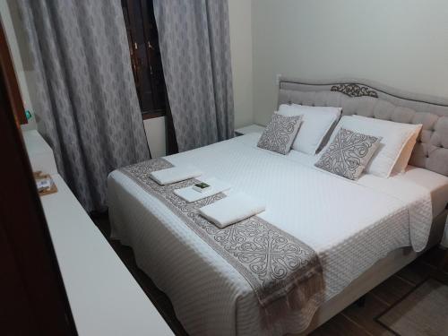 En eller flere senge i et værelse på Hospedom Mazzoca 01, WC compartilhado