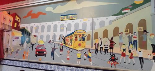 a mural of a street with people and a bus at Lapa Bed & Breakfast in Rio de Janeiro
