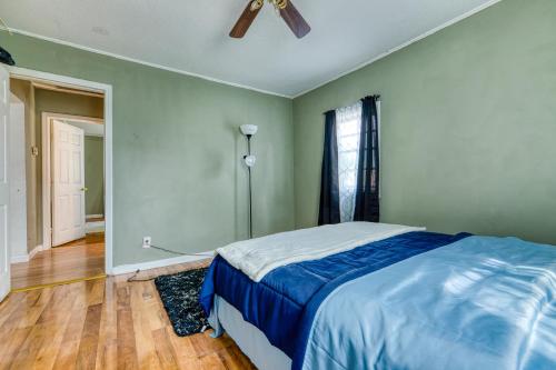 a bedroom with a bed and a ceiling fan at Humble home with free breakfast offered if requested! in Chicopee