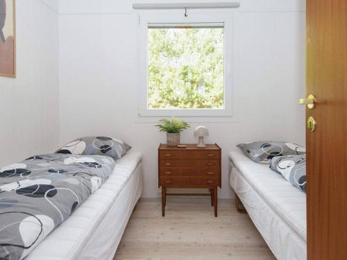Postel nebo postele na pokoji v ubytování Holiday home Glesborg CIX