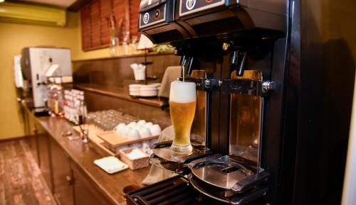 Kuchyň nebo kuchyňský kout v ubytování Business Resort Kyuan