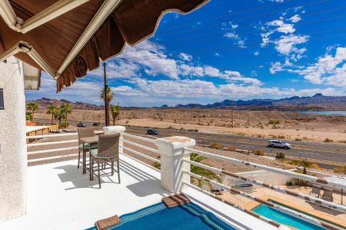 an outdoor deck with a view of the desert at LakeView Home Minute From New Launch With Pool And Spa in Lake Havasu City