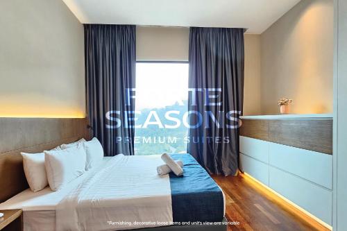 a hotel room with a bed and a window at Forte Seasons Genting Geo38 in Genting Highlands