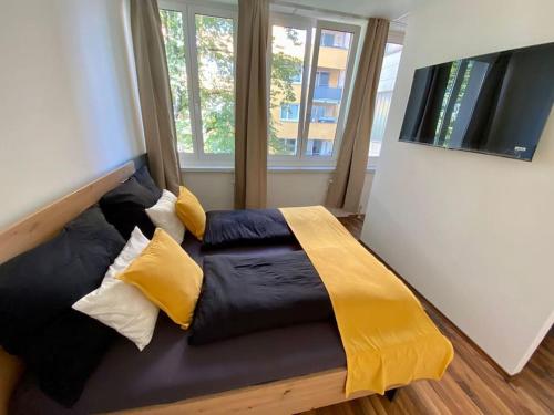 Ένα ή περισσότερα κρεβάτια σε δωμάτιο στο Apartment C'est la vie
