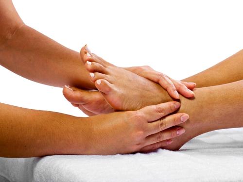 two people putting their hands on their legs at PWL Healing Retreat Accommodation in Rotorua