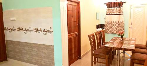 Zona de estar de Mahalakshmi Homestay