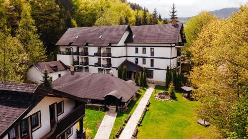 an aerial view of a large white building at Casa Octavian in Suceviţa