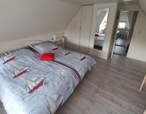 Katil atau katil-katil dalam bilik di Ferienhaus Alte Kate