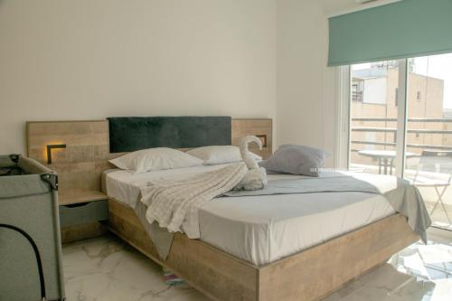 Llit o llits en una habitació de Mad beach