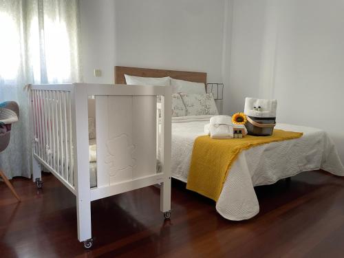 Ένα ή περισσότερα κρεβάτια σε δωμάτιο στο O Xaneiro