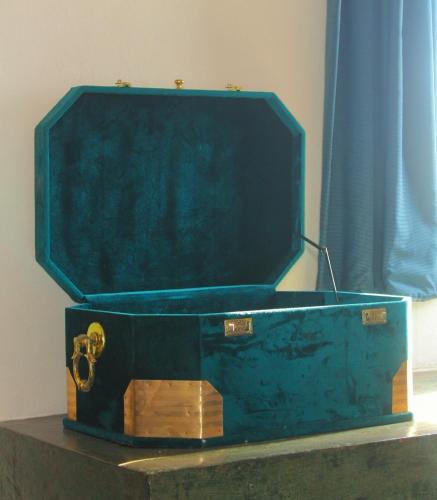 a blue suitcase sitting on top of a table at Riad Sahara Sunset Beach Douira Agadir in Douaïra
