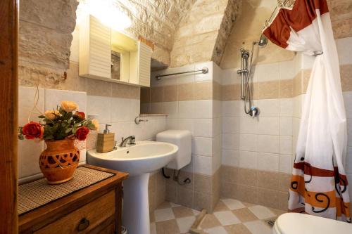 Phòng tắm tại Trullo Relax