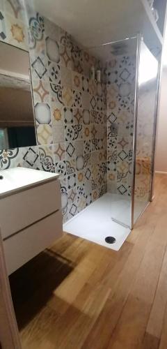 a bathroom with a sink and a mirror at Residenza tre spighe in San Felice del Benaco