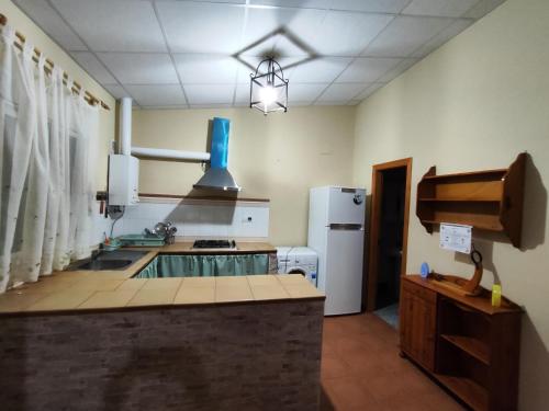 Kuchyň nebo kuchyňský kout v ubytování Casa Rural Mesa del Lobo Perita