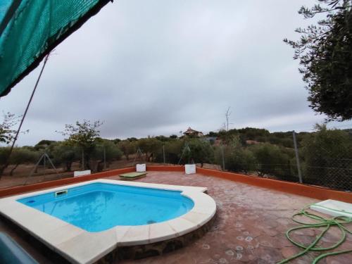 Bazén v ubytování Casa Rural Mesa del Lobo Perita nebo v jeho okolí