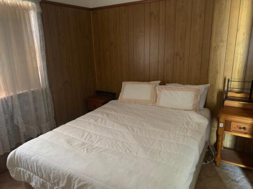 Ein Bett oder Betten in einem Zimmer der Unterkunft Blue Sapphire Village 3 Bedroom