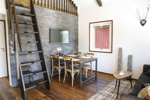 a dining room with a table and chairs at Dragsö Camping & Stugby in Karlskrona