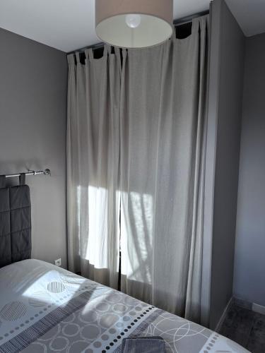 Katil atau katil-katil dalam bilik di Gîte La vue étoilée