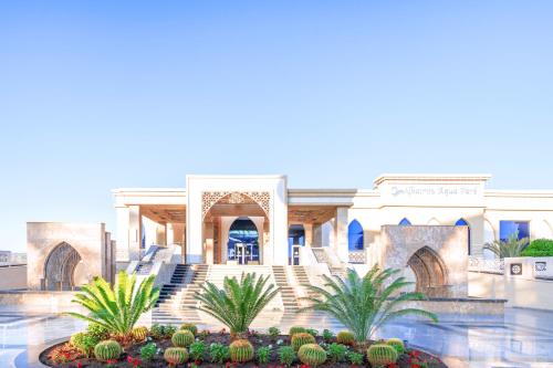 a rendering of the exterior of a mosque with palm trees at Pickalbatros Aqua Park Sharm El Sheikh in Sharm El Sheikh