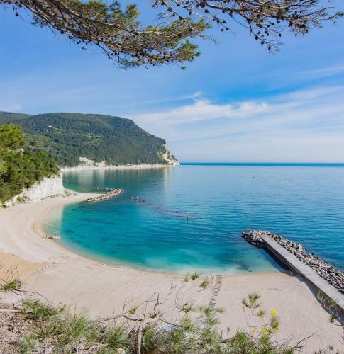a view of a beach with blue water at B&B ROSE OSIMO in Osimo