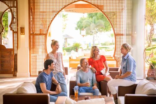 a group of people sitting in a room at Robinson Soma Bay in Hurghada