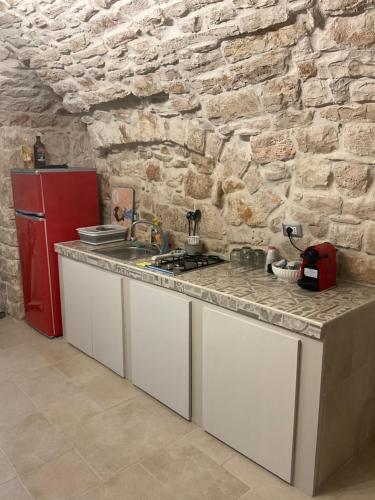 A kitchen or kitchenette at B&B la ninnilla