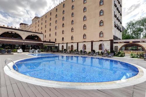 Bazén v ubytování Suhan Cappadocia Hotel & Spa nebo v jeho okolí