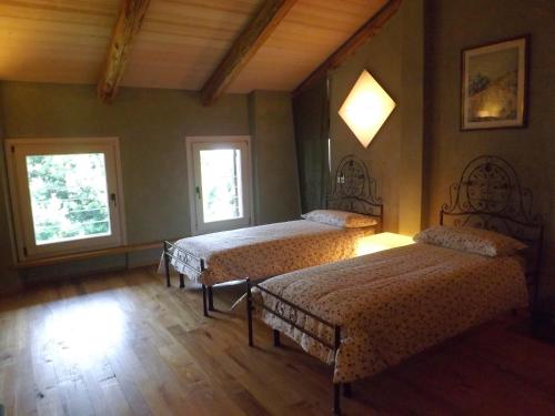 Кровать или кровати в номере Guest house Cascina Belsito