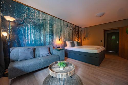 Postel nebo postele na pokoji v ubytování Landhotel Zur Schmitte