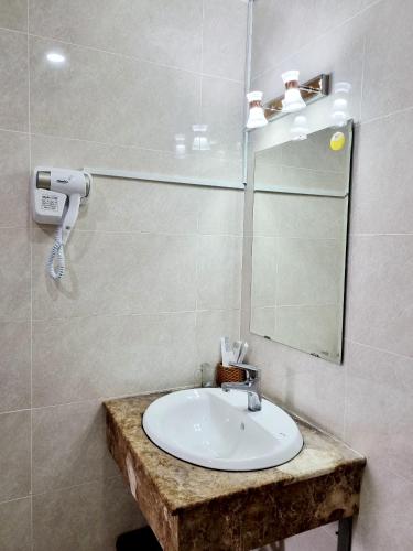 Ένα μπάνιο στο Minh Khue Hotel