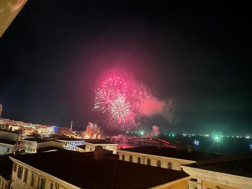 a firework display in the sky at night at Mellon OASIS Phu Quoc in Phu Quoc