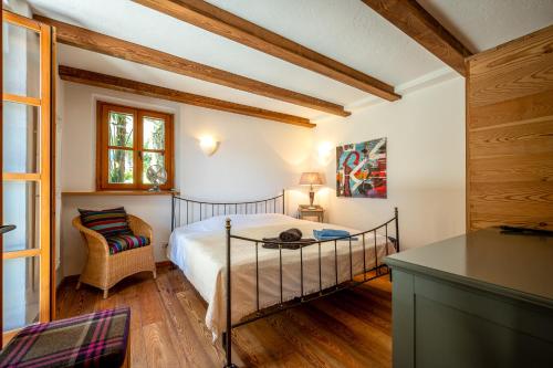 Postel nebo postele na pokoji v ubytování Rustico-Ferienhaus Dolce Vita