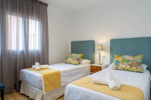 Ένα ή περισσότερα κρεβάτια σε δωμάτιο στο Luxury Apartment Torremolinos