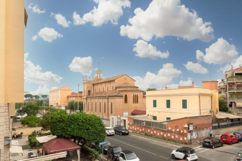 a view of a city with cars parked on a street at Fleming Suites by Hili in Rome