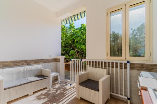 Ένα ή περισσότερα κρεβάτια σε δωμάτιο στο Appartamento Arancio 3