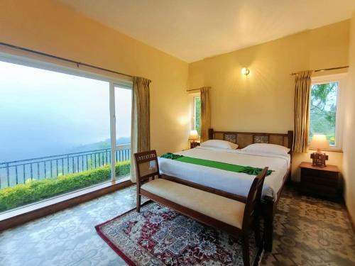 Una cama o camas en una habitación de Teanest Nightingale by Nature Resorts and Stays