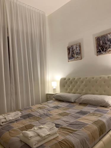 Postel nebo postele na pokoji v ubytování RESIDENZA LETIZIA