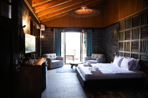 Χώρος καθιστικού στο MAVİ AT HOTEL Blue Horse