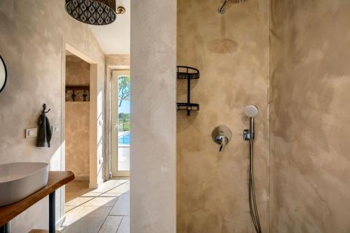 Vannituba majutusasutuses Family villa Rapavel with pool in Visnjan